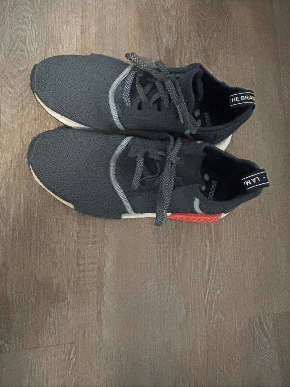 adidas Men's Black Athletic Shoes with Red Heel Accent